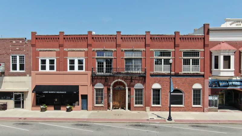 113–117 E. Grand